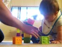 Jake plays with blocks