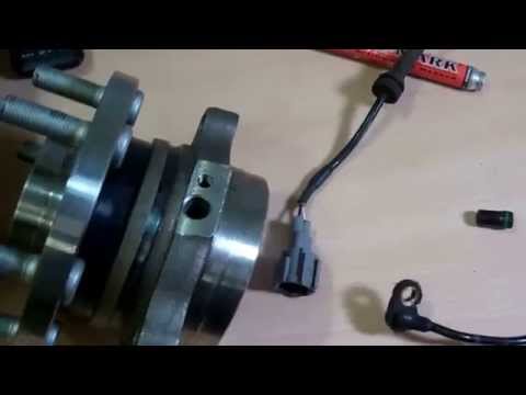 How to change the front ABS sensor on a Nissan Navara D40