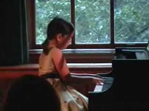 Chopin Winter Wind, performed at age 8 at the Bradshaw and Buono Competition. She placed 2nd. See video