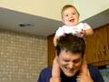 Baby Teagan on Daddy's Shoulders