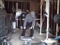 Gabe's sandbag power clean, with ring push-ups
