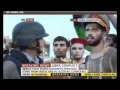 Libyan wears Gaddafi's hat