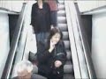This woman goes flying down the escalator face first. The last woman they show looks a tad guilty...lol.