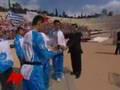 Olympic Torch Given to Chinese Amid Protests