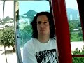 Aaron North rides a cable car