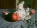 Devin Rolls Over for the First Time at 6 Weeks Old