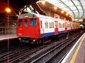 Metropolitan tube train leaves Farringdon station