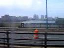 ashmont-bound red line of 01700s just creeping up the longfellow bridge, then making a stop at charles/ mgh. while we are stopped at  charles/mgh you see an alewife-bound train of 01800s also stopped at charles/mgh.