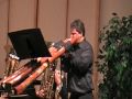 Todd Johnson premiers Didj: Concerto for Didjeridu with the Oregon Wind Ensemble, composed by Sean Wagoner. Patricia Cardona, principal flute/bass flute, Cassie Lear annd Haley Cameran piccolo, Ella Anderson and Lacy Chrisco flutes. Mvt. 3 was inspired by some of the rythmic grooves and ostimati that comprise much of Todd's approach to didjeridu playing. The ensemble bursts with staccato interpretations, inter playing with the rhythms of the didjeridu groove. www.patriciacardona.com