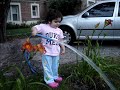 Alexia playing with water, Luli and Pablo