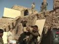 British mentors patrol with Afghan soldiers in Helmand