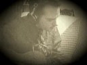 Phil playing guitar & trying to sing