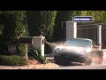 Patrick Dempsey washes his car with his daughter