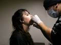 Mandy gets her tounge pierced