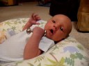 odin plays with his rattle