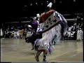 Old footage of Native American Indian fancy shawl women dancing. Native American Indian dancers doing two fancy shawl dances. Pow wow dancing. The story of the Fancy Shawl as was told to me, was that a Native woman lost her warrior husband and she went into a shell, like a cocoon, and she realized that she must go on, and like a butterfly, emerged from her cocoon, in full flight to face the world. There are other stories and if you have one, you can share it.