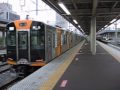阪神尼崎駅　なんば線快速急行vs本線普通の同時発車バトルa