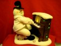 A PIANO PLAYING JAZZY SNOWMAN DELIGHTS WITH CHRISTMAS CLASSICS!