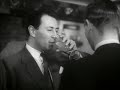 a clip of alyn ainsworth and the bbc northern dance orchestra in 1959, presenting a 'make way for music' show from the playhouse, manchester. the announcer is roger moffat. the scene is intercut with footage of the bbc at lunchtime, including judith chalmers &  david coleman.