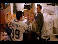 3 guys hanging out before going out on the town of hollywood. 2 are playing a hockey video game and talking some funny $#!% to each other.