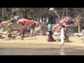 Anjuna beach showing sunbathers' & paragliders ...