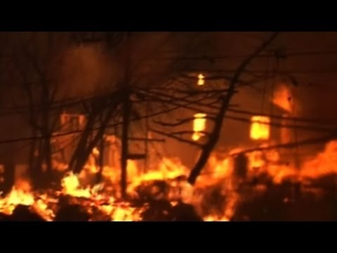 in queens - Firefighters were fighting early Tuesday to contain a blaze sparked after superstorm Sandy which has destroyed 50 homes in the New York borough of Queens. Du...