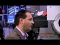 Stirling Energy Systems featured their new Stirling Engine powered Concentrated Solar Power (CSP) Suncatcher System at this year's Solar Power International conference. The Buildaroo News Team interviewed Brian and Jeff about the product's technology, energy efficiency and manufacturing process. What's particularly striking is that the company uses automotive manufacturing plants to produce this product. Watch the video above to see the product in action and find out what Brian had to say. How the product works: Mirrors concentrate the sunlight into the solar receiver which heats up the hydrogen gas contained in the system to around 700 degrees. This temperature increase pushes the pistons and generates electricity. Features: - Does not use any water for energy production, while other CSP technologies require water as a cooling agent. In this Stirling Energy Systems product, water is only used to cleanse the product. - The Stirling Energy System technology is completely clean with no combustion. - The technology is highly scalable as it can be manufactured in 25 megawatt blocks. Stirling Energy Systems manufactures their engine and mirror facet using an automotive assembly line in Detroit, Michigan since these plants have many years of experience in manufacturing engines. The product is appropriate for utility scale installations and is currently available on the market.