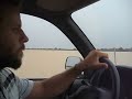 Driving a Toyota Hilux after the first rain of the wet season, Burkina Faso.  The car flooded on a subsequent crossing.