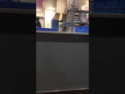 Dominos Pizza - Nasty "supervisor" eating where food is being prepared!!!