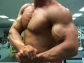 Bren Baldwin posing biceps and pecs