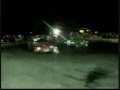Carro da PM participando de racha