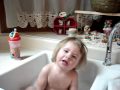 Julianna takes a bath and talks with mom and dad