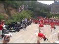 red hub of beijing olympic orchestra, including the james logan hs group, performed at the great wall of china on aug 4 2008. check out my tiananmen square video too for more songs. enjoy!