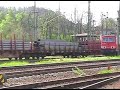 Baureihe 189 042-5 der Deutschen Bahn AG fährt mit einen gemischten Güterzug im Bahnhof von Saalfeld an und verlässt den Bahnhof in Richtung Süden./Class 189 042-5 from the 