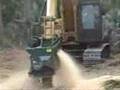 Brown Brontosaurus Mower Working in Florida