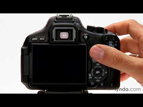 how to set timer on canon eos 1100d