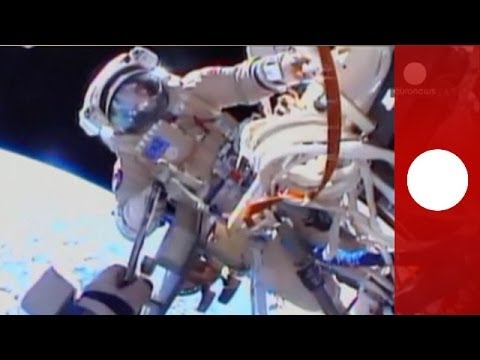 Spacewalk POV: Cosmonauts at work 400 km above Earth at ISS