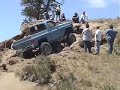Chevy Truck Polishes driveline on a boulder