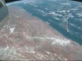 view from ISS:Endeavour follows 18,000 km behind