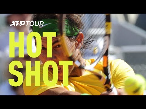 Nadal's 'Tweener against Djokovic during Madrid Final Nadal's 'Tweener against Djokovic during Madrid Final