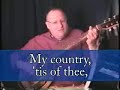 Michael D. Purvis:  \"America\" on banjo (banjitar)