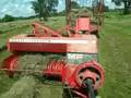 John Deere 6200 baling hay