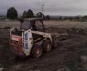 A 2.5 Tonne Bobcat moving a 3.5 Tonne rock