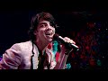 grab a backstage pass to the jonas brothers' motion picture debut! kevin, joe and nick are 