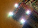Not a fun title, but describes the project: a PIC16F628 microcontroller controlled via the serial port which controls 4 RGB LEDs using 4-bit PWM
