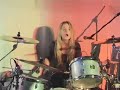 Florrie Arnold drumming at a gig in Bristol