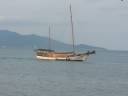 Thai Sail Boat Arrives Gracefully at Boh Phut Bay, Koh Samui, Thailand Thai Sail Boat Arrives Gracefully at Boh Phut Bay, Koh Samui, Thailand