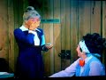 the wonderul and sexy goddess doris day and her beautiful purple fuzzy slippers. they are to die for! wish clip was longer.