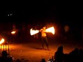 fire twirler at full moon party
