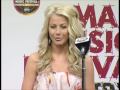 Julianne Hough answers questions in the Press Room during the 2009 CMA Music Festival. Be sure to watch 